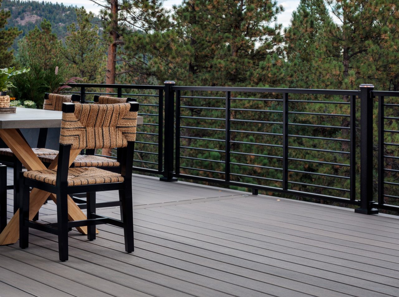 Exterior photography of 2023 HGTV Dream Home in Morrison, Colorado. Photography of Belgard Hardscape products and Trex composite decking and railing.