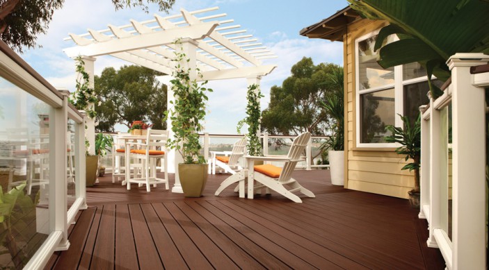 trex-transcend-decking-lava-rock-railing-classic-white-vintage-lantern-glass-panels-pergola-outdoor-furniture